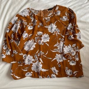 Rust floral blouse